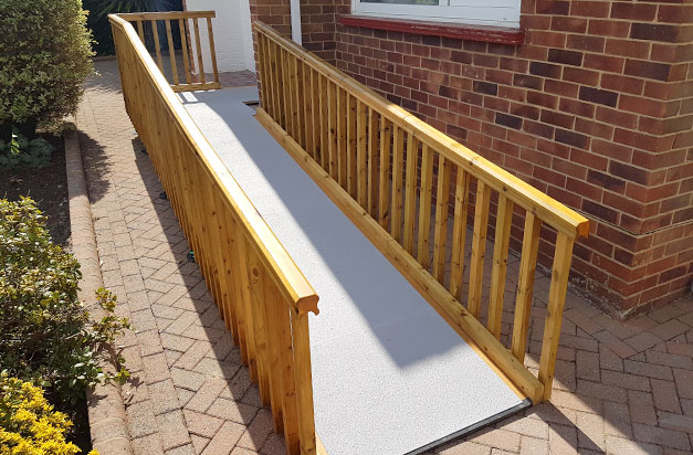 Non slip floor sheets improve safety on doorway access ramps.